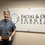 Smiling man from our staff at {PRACTICE_NAME}